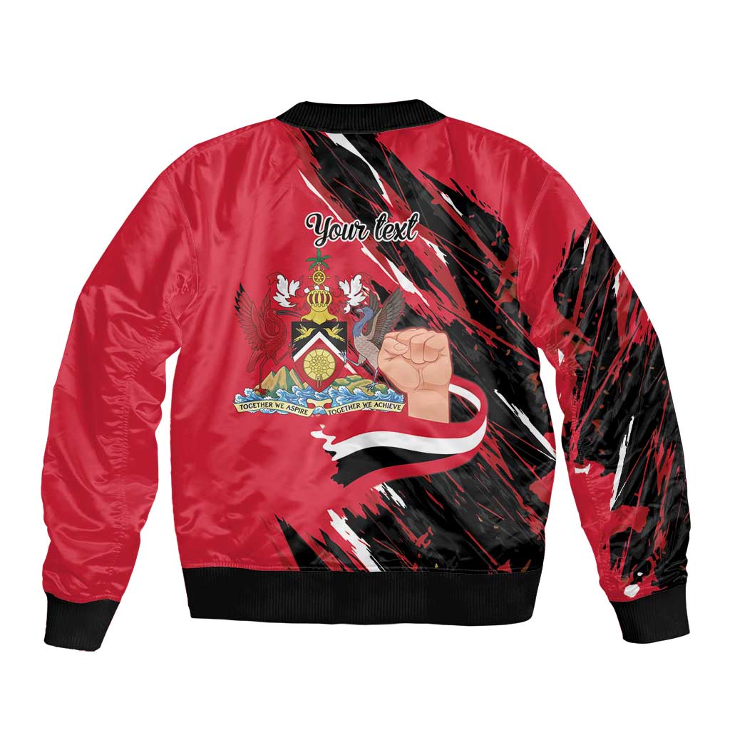 Red bomber jacket back with black-and-white graphic, ribbed collar, cuffs, and hem.