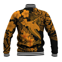 Back view of gold and black varsity jacket with tribal tattoo print and hibiscus flowers