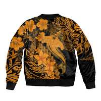 Black bomber jacket with gold back graphic, hibiscus flowers, and tribal patterns.