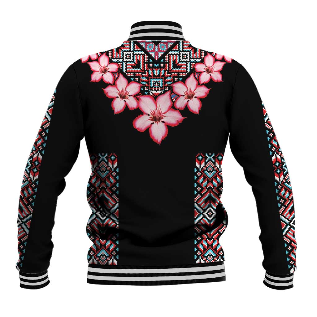 Black baseball jacket with pink hibiscus flowers and tribal geometric pattern sleeves.