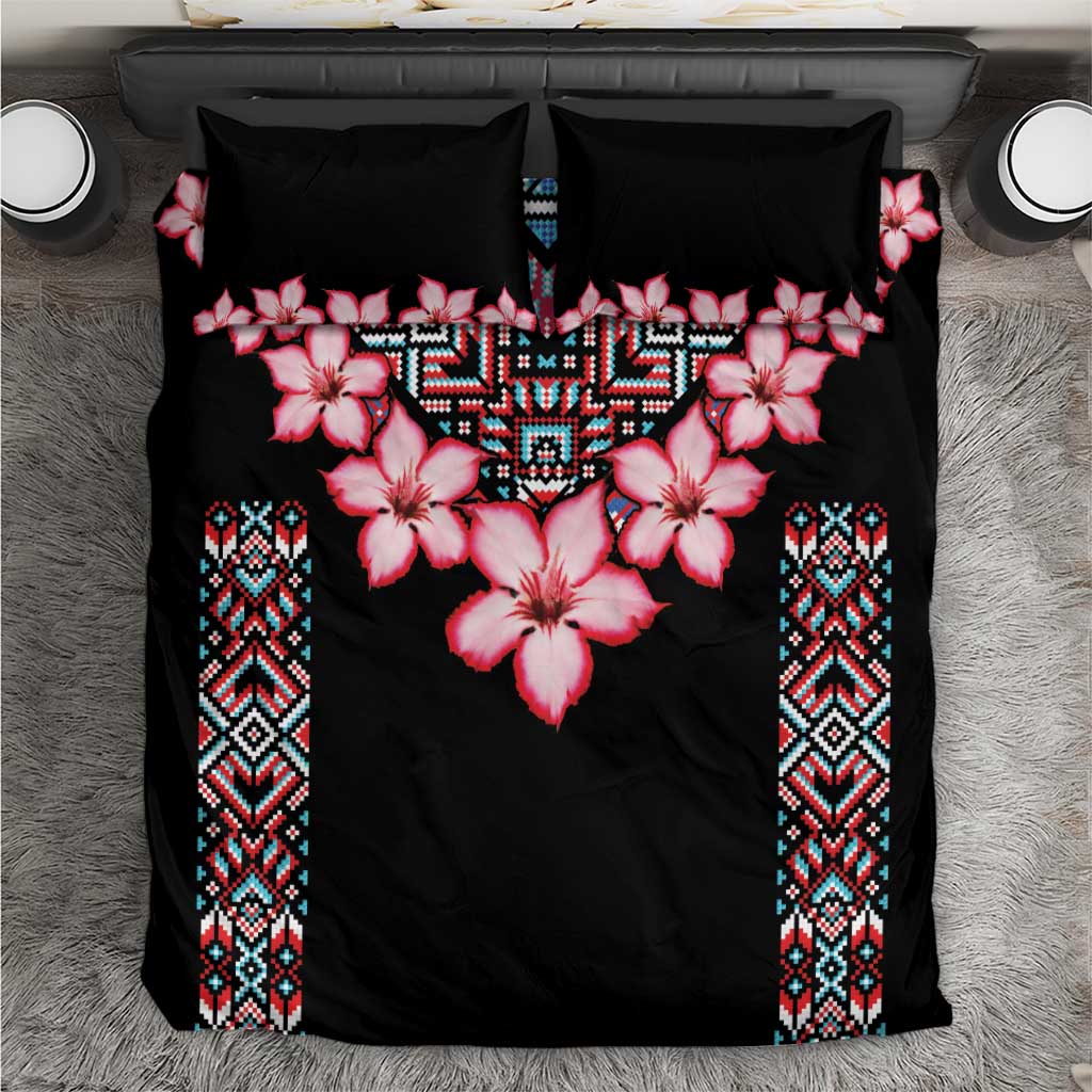 Black duvet bedding set with pink hibiscus flowers and blue tribal border panels