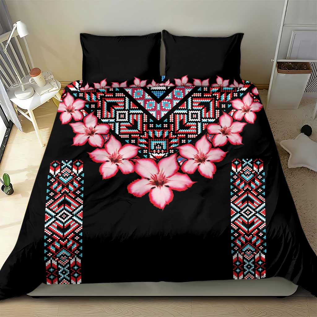 Black duvet bedding set with pink hibiscus flowers and blue geometric tribal side borders