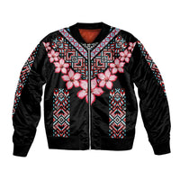 Unisex black bomber jacket with pink hibiscus flowers and tribal geometric front