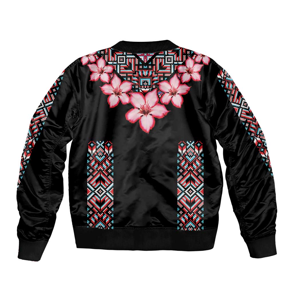 Unisex black bomber jacket with pink floral chest and patterned vertical panels
