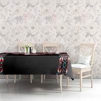 Black tablecloth with red flower motif and colorful tribal side pattern