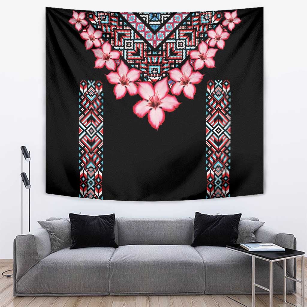 Black tapestry with pink flower cluster and colorful geometric tribal border