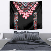 Black tapestry with pink flowers over a central diamond geometric design