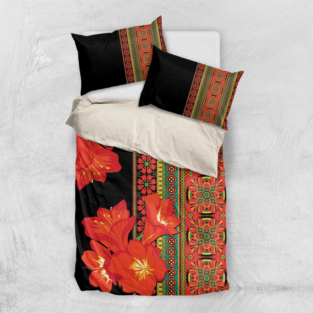 Black bedding set with orange-red flowers, vertical decorative border, and two black pillowcases