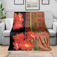 Africa Beauty Clivia Miniata Flowers blanket draped on couch with black, orange-red floral design