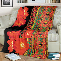 Africa Beauty Clivia Miniata Flowers blanket on couch showing black floral and colorful striping