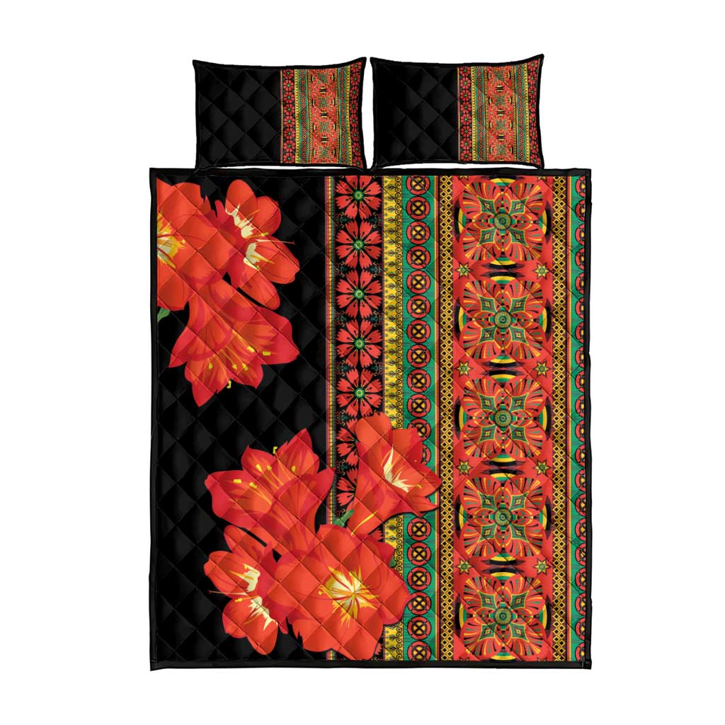 Black quilt bed set with red orange clivia flower print and decorative green border stripes