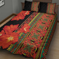 Black quilt bed set with large red clivia flowers and green patterned runner center