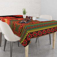 Black-and-red clivia floral tablecloth with green and yellow geometric trim