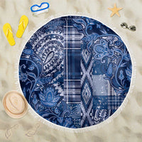 Round blue beach blanket with paisley floral patchwork and white fringe edge
