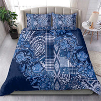 Blue paisley bedding set with patterned duvet cover and two pillow shams, allover floral motif