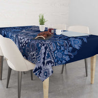 Blue paisley floral tablecloth on dining table with patterned centerpiece panel