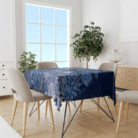 Blue paisley floral tablecloth with paisley stripe across table top and side drape