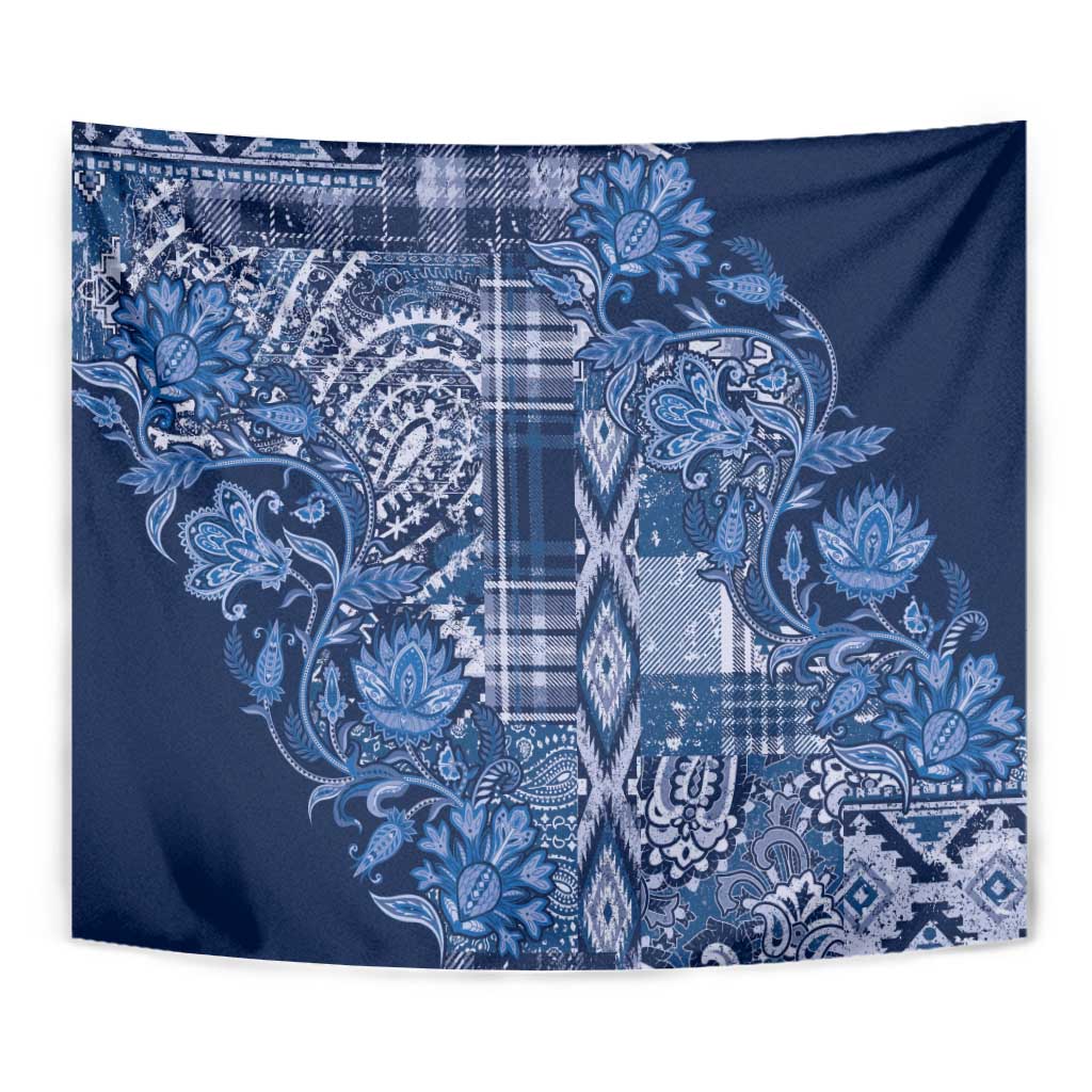 Blue floral shuka tapestry close-up with paisley, leaves, and plaid patchwork center