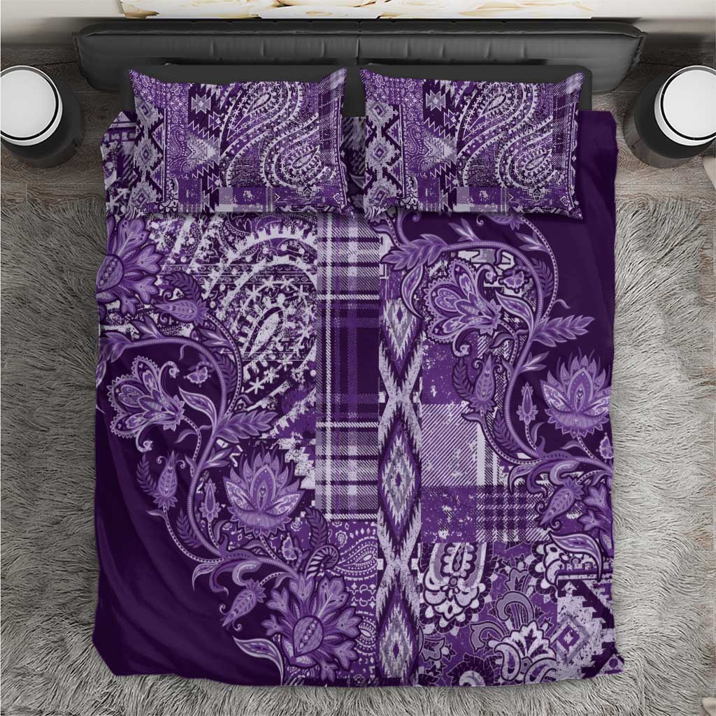 Purple patterned shuka bedding set with matching pillow covers, folded flat