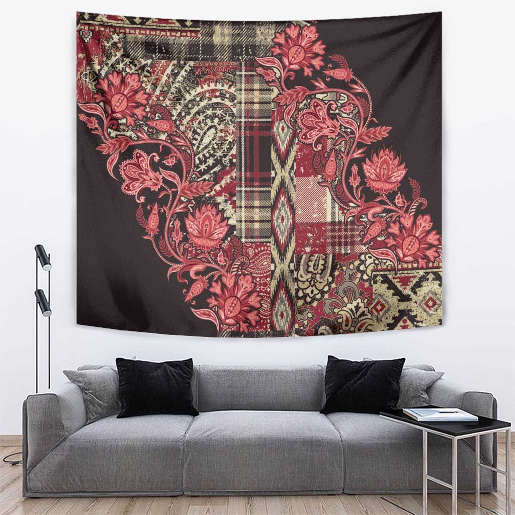 Maasai shuka tapestry with red floral and geometric pattern on dark fabric