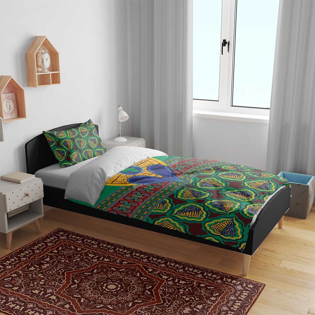 Green kanga-style bedding set on bed with matching pillows and tribal artwork
