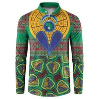 Green button-placket sweatshirt with bold African pattern, yellow sunburst and blue heart motif