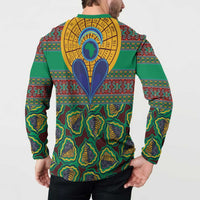 Green African-pattern sweatshirt, back shows yellow circle sunburst and blue heart wings