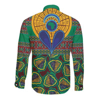 Long-sleeve button shirt back with green African kanga pattern and central emblem