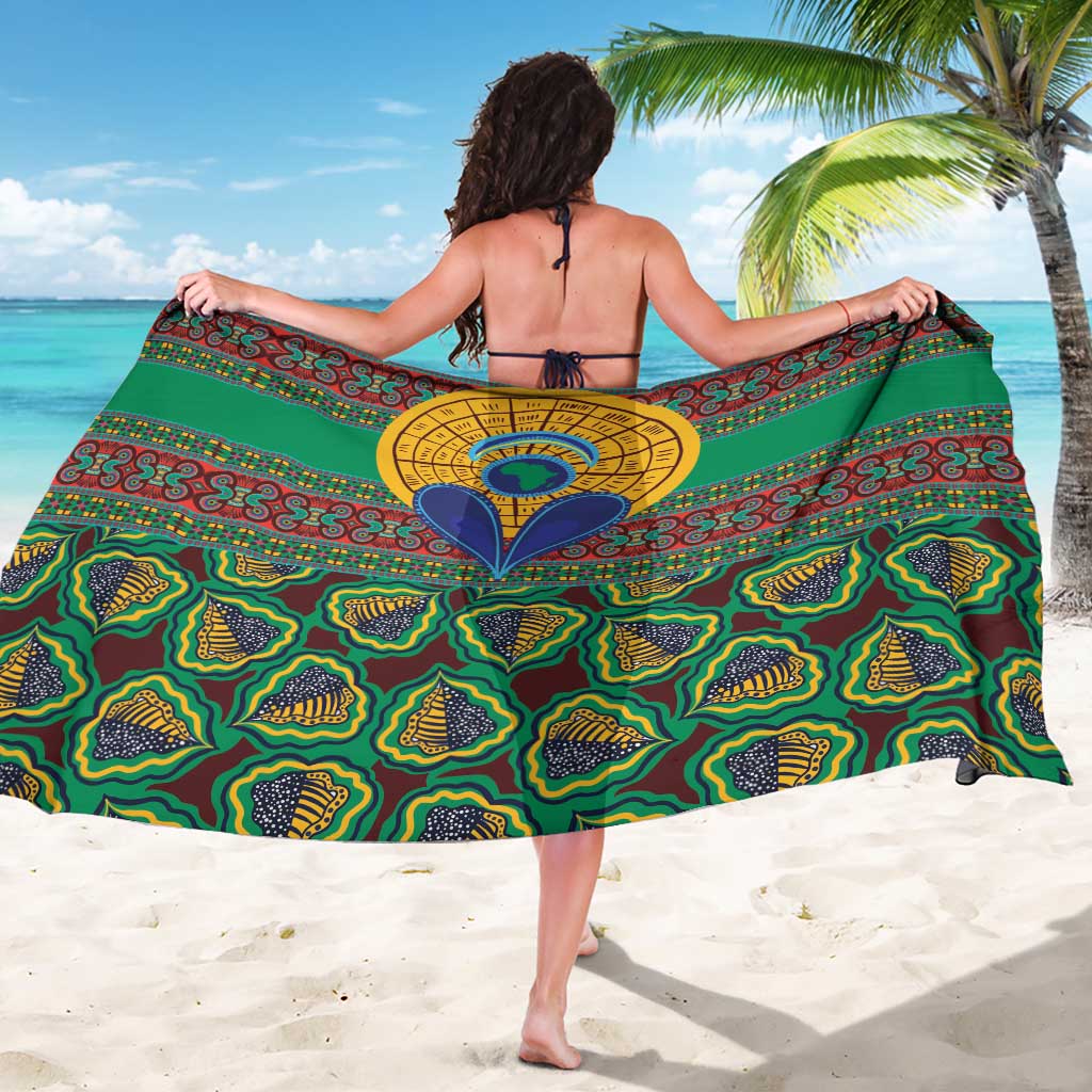 Green kanga-style sarong with large blue-yellow medallion and repeating swirl patterns