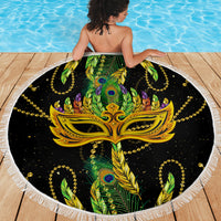 Round beach blanket with fringe, black center with gold Mardi Gras mask and green feathers