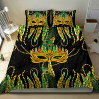 Feather mask Mardi Gras bedding set: black comforter and 2 pillows with green feather crests and gold mask