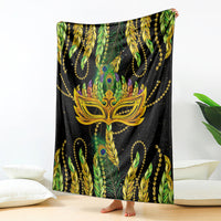 Green feather mask Mardi Gras throw blanket with ornate gold masquerade mask center