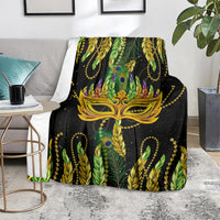 Mardi Gras feather mask blanket in green and black, gold mask and feather pattern
