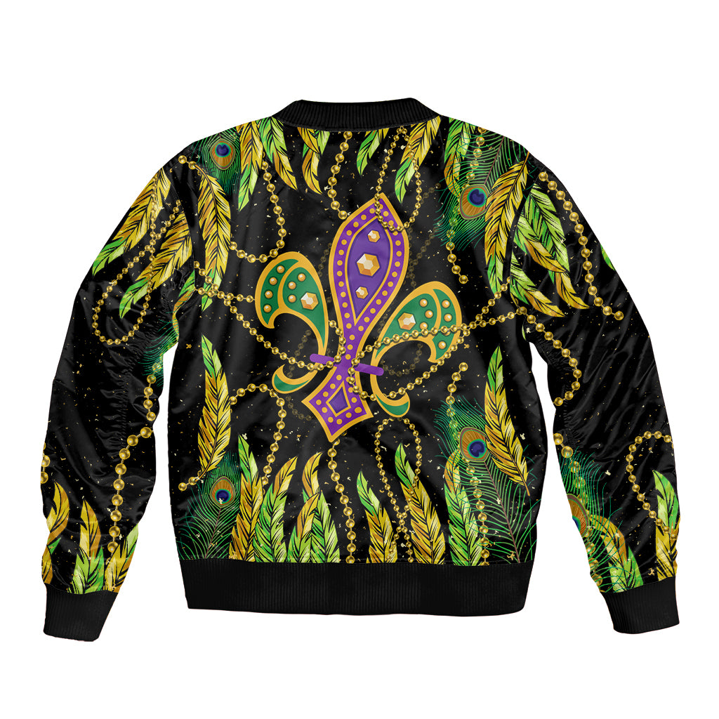 Bomber jacket with black base, green-yellow feather print and fleur-de-lis mask art