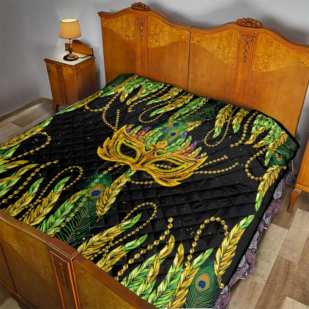 Feather mask Mardi Gras quilt on bed, black with green and yellow feathers and gold mask