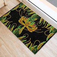Feather mask Mardi Gras rubber doormat angled view with yellow mask and green feathers