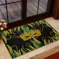Feather mask Mardi Gras rubber doormat at doorway with black, green and yellow feathers