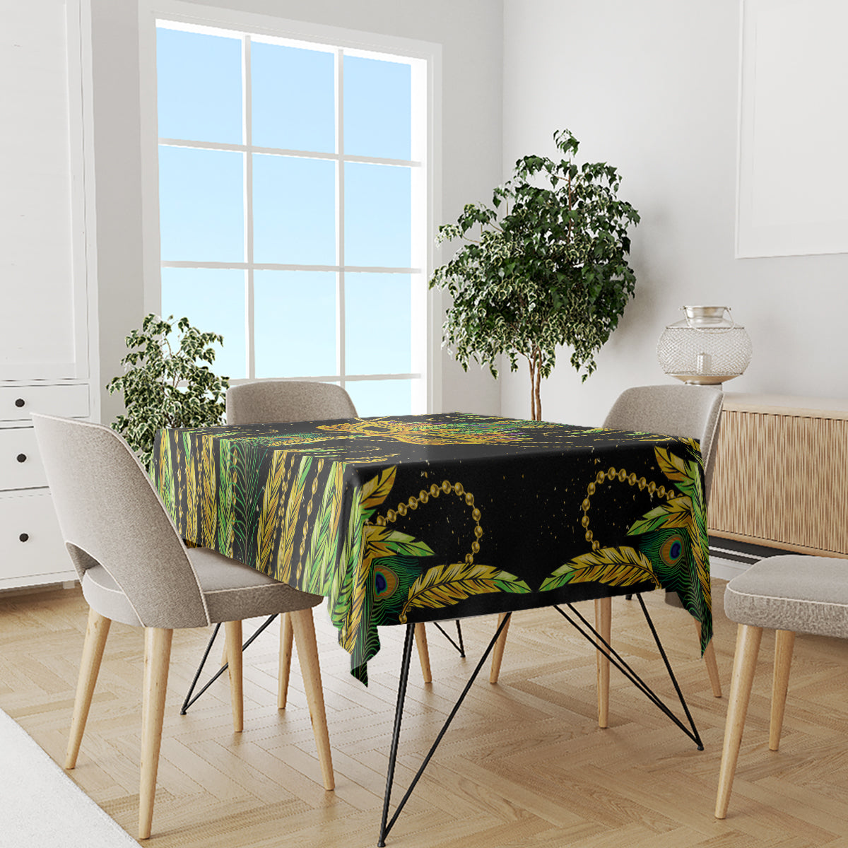 Green peacock feather patterned tablecloth covering dining table surface