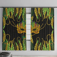 Green, gold, and black feather-mask window curtain panels with decorative chains and beads.