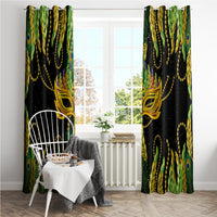 Green feather-pattern curtains with gold masquerade mask motif and beaded chain details.