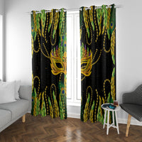 Green, gold, and black feather-mask window curtain panels with ornate mask and plume design.