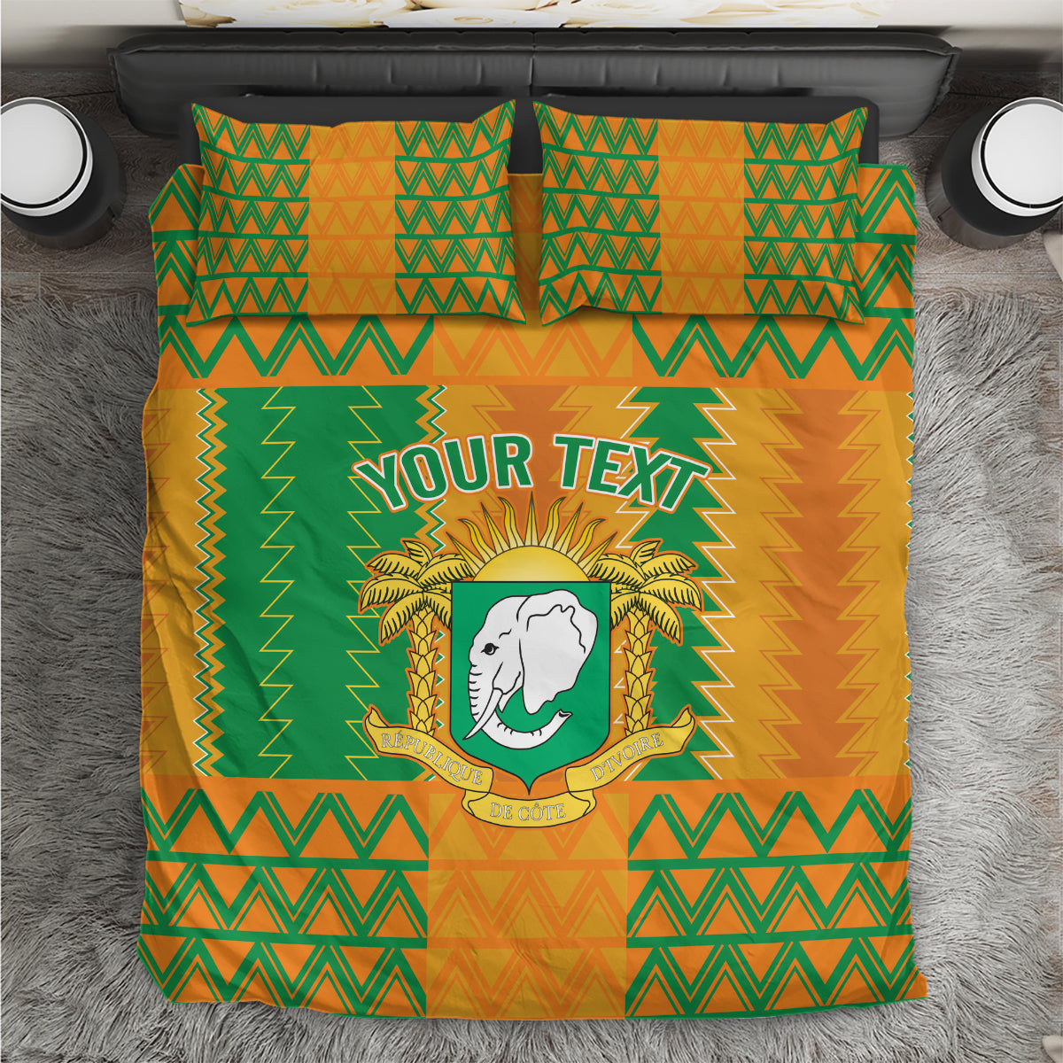 Football bedding set duvet with orange-green tribal zigzags, 'Your Text' and elephant crest.