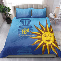 Blue comforter set with yellow sun mascot, 'Your Text' and 'We are the champions'