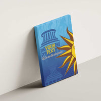 Blue canvas wall art with column and sunburst graphic, custom text, mounted on wall