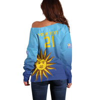 Women’s off-shoulder blue football sweater, back print with number 21 and sun graphic