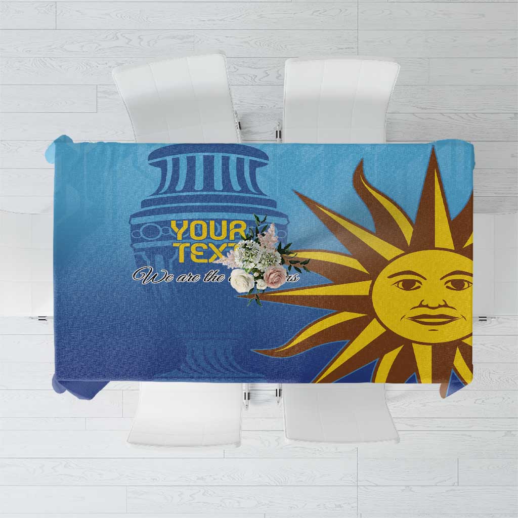 Blue football-themed tablecloth with yellow sun face graphic and dark blue rays