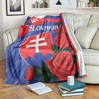 Slovakia flag blanket with red roses and white text design, folded over a couch