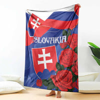 Slovakia flag blanket with red roses and blue-white shield emblem, standing on floor