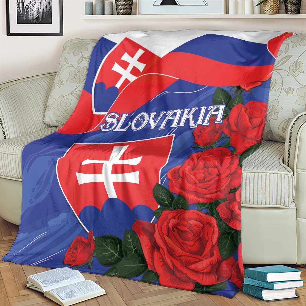 Slovakia flag blanket with large red rose print and flag stripes, spread on couch