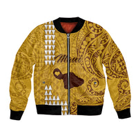 Gold unisex bomber jacket with tribal Polynesian print, front zipper, ribbed cuffs